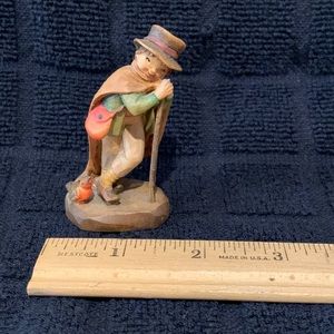 ANRI wood carving - weary traveller